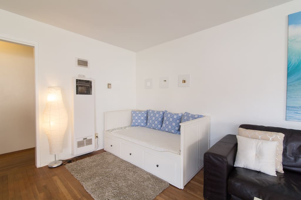 Living room has huge sofa and day bed that can pull out to King Size Bed, in case 4 bedrooms is not enough.