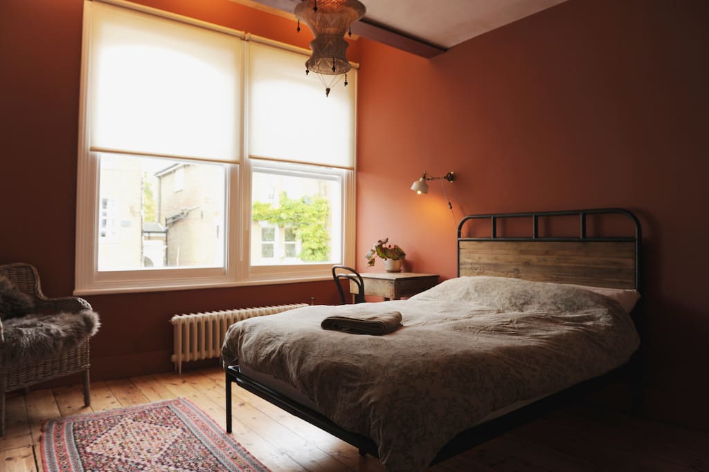 Stylish bedroom with tonnes of light.
