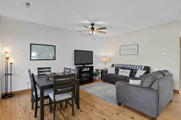 Cozy living room. Cuddle up with your special someone turn on the electric fireplace and enjoy Netflix, Hulu or your favorite streaming platform via Roku and your account!