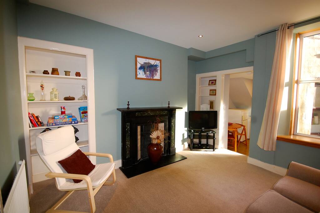 Cosy Lounge Leading to Kitchen