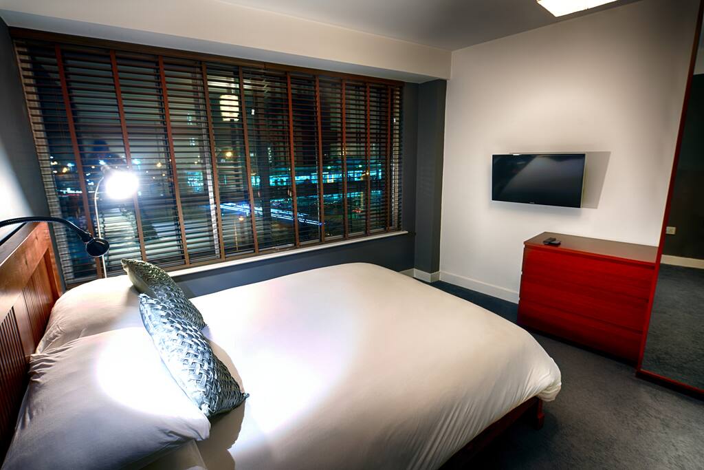 Main Bedroom with wall mounted TV