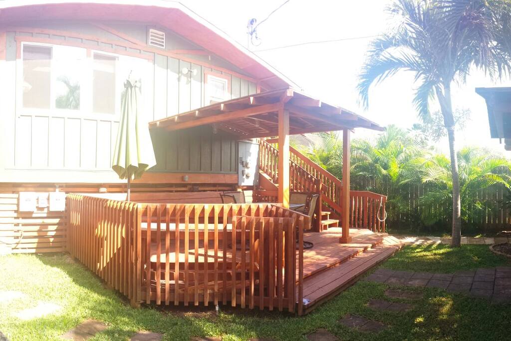Another view of the yard & partial covered deck.