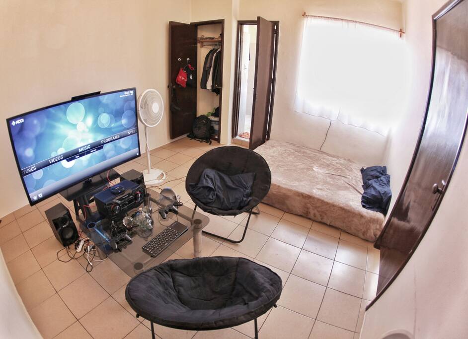 the main room gets alot of light during the day. the television can easily be turned to comfortably be viewed from the bed.
