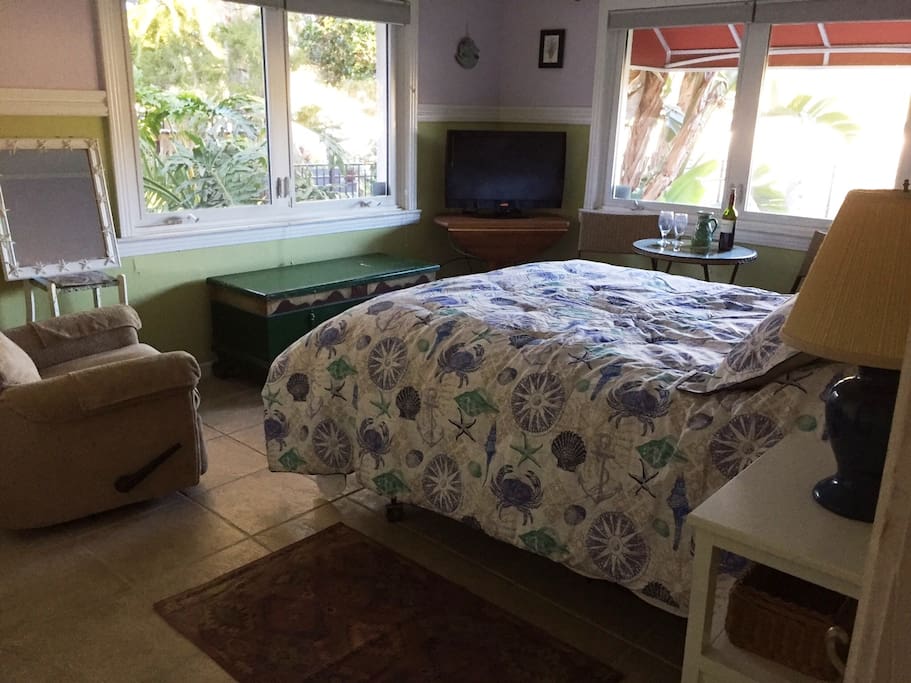 Lakeview bedroom with Queen bed, TV, recliner, bistro table