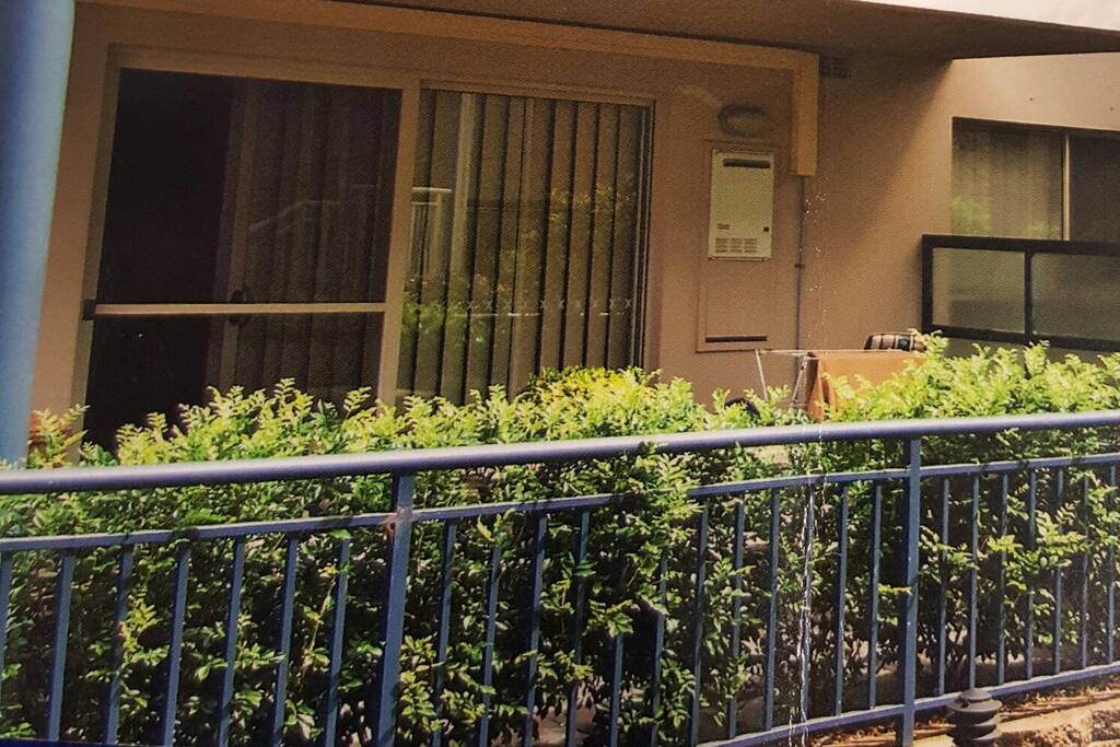 Secure private groundfloor apartment with enclosed courtyard