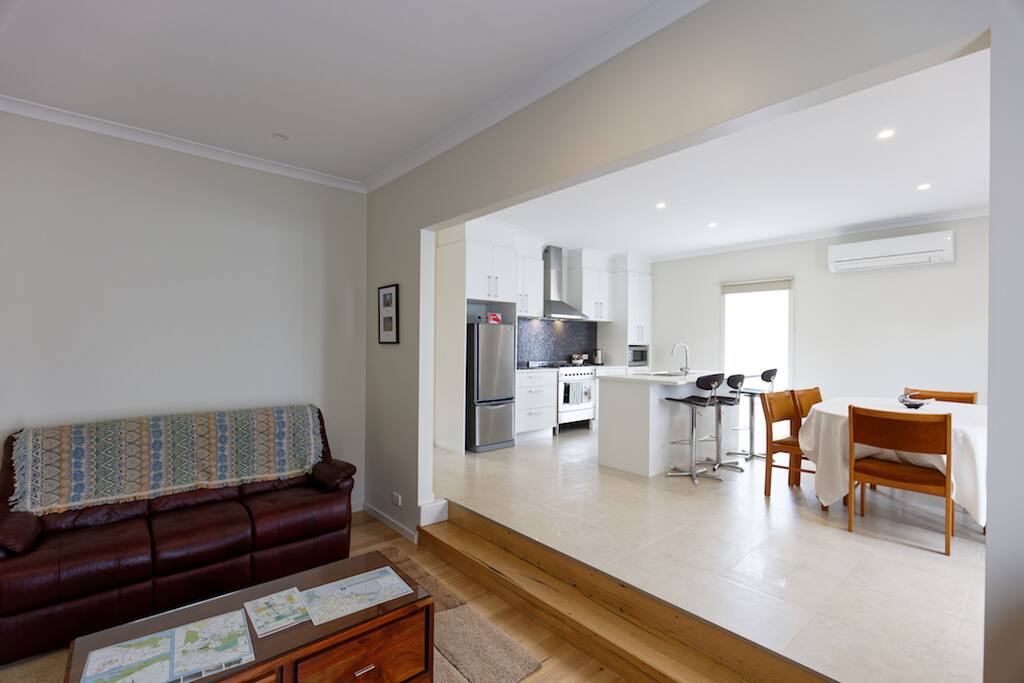 in lounge looking at open plan of the Kitchen