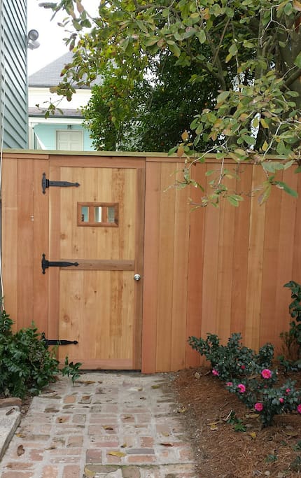 Locking entrance adds security to backyard entrance to carriage house.