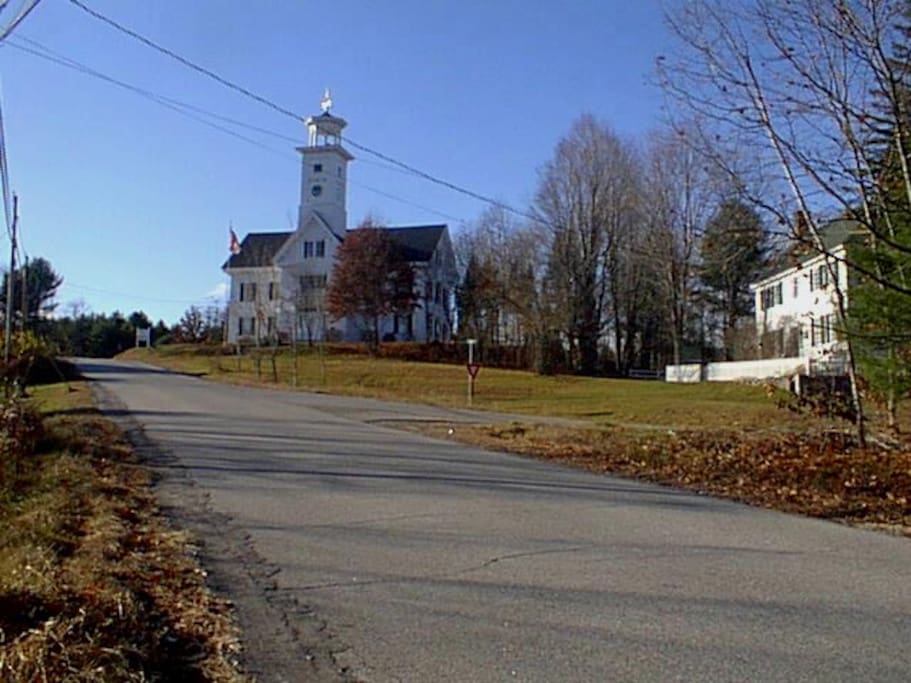Looking up the hill from the side yard - Effingham Library at top of hill.