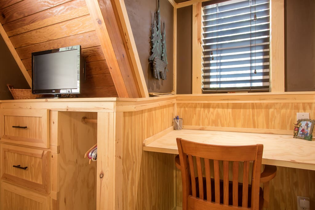 desk and closet in back bedroom
