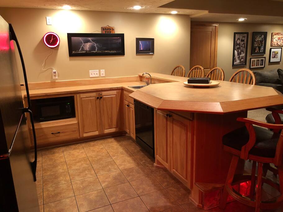 dishwasher, microwave, pizza oven, glasses. dishware