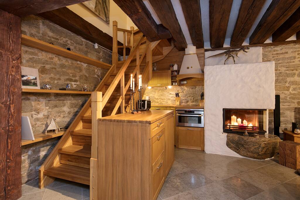 Kitchen corner has a dishwasher, washing machine, oven, stove etc.
