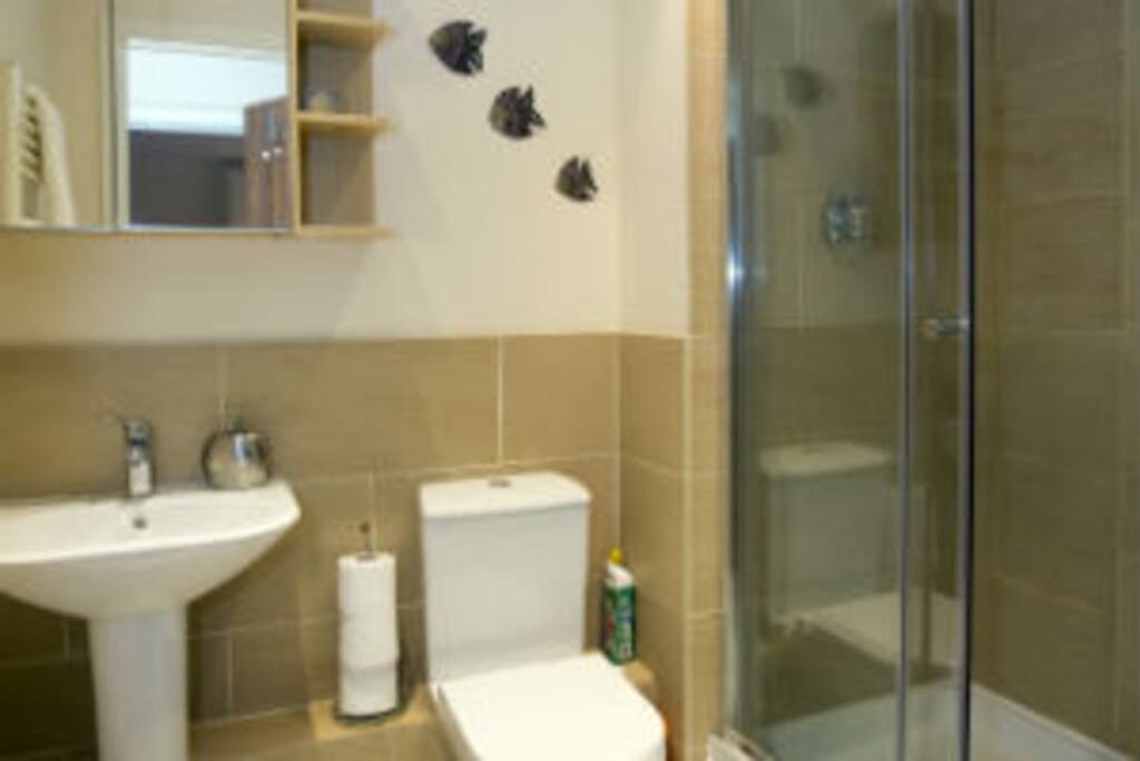 The spacious family bathroom is ideal for a group or small family with a large shower cubicle and luxury bathroom fittings