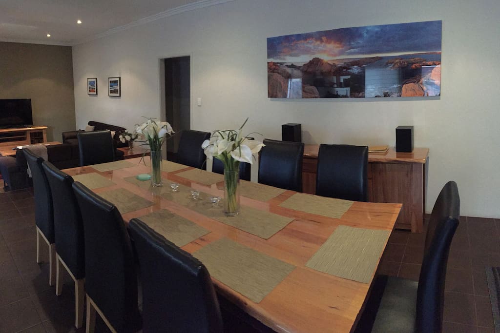 Open plan dining with large dining table, seats 10-12