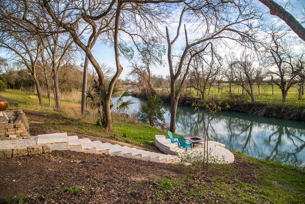 backyard river view limestone deck