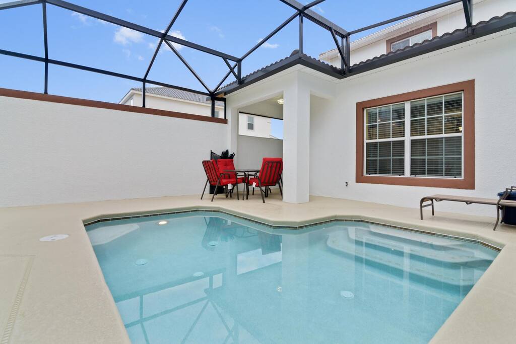 The plunge pool area at this spacious townhome is a great area to relax and take a dip after a long day at the area theme parks.