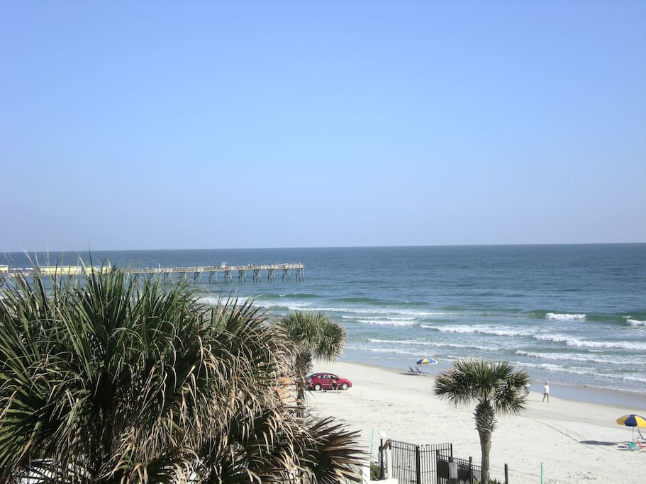 View from our condo of pier & Crabby Joe's