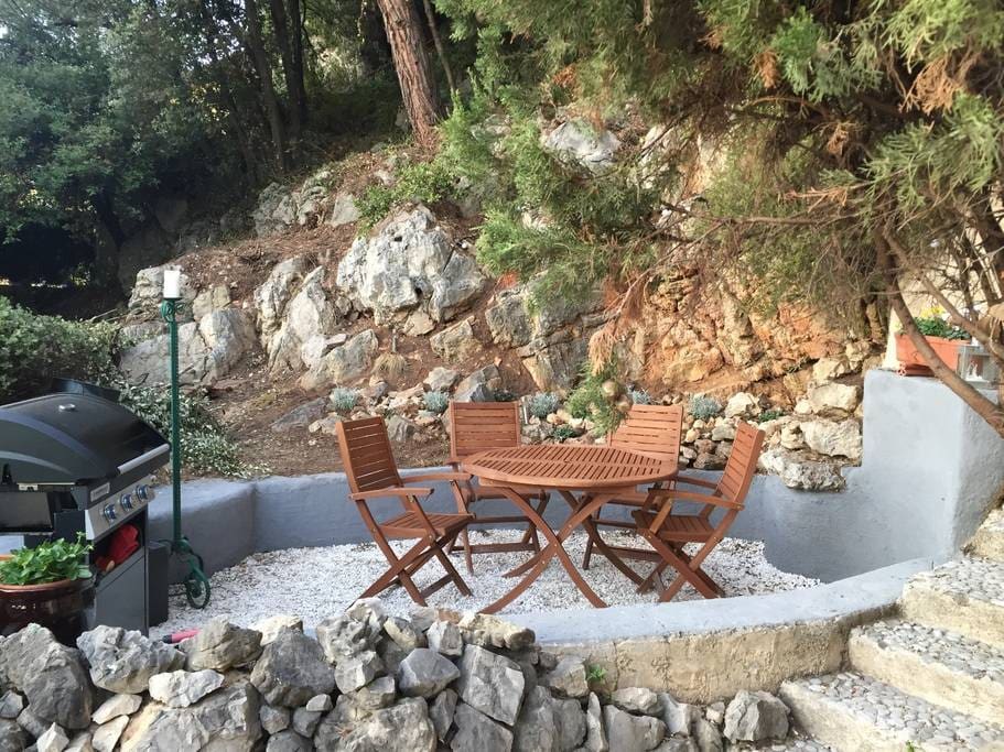 Outdoor seating and BBQ area