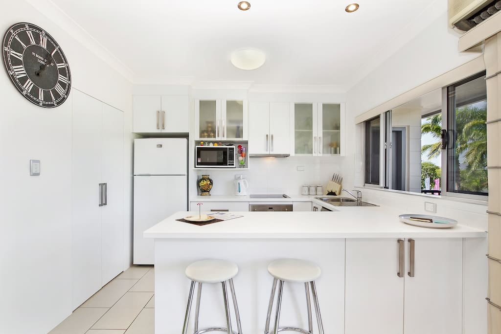 THE KITCHEN IS FULLY STOCKED WITH ALL MODERN EQUIPEMENT. LOOK ACROSS TO THE WATERPARK AND MAGNETIC ISLAND WHILE IN THE KITCHEN.