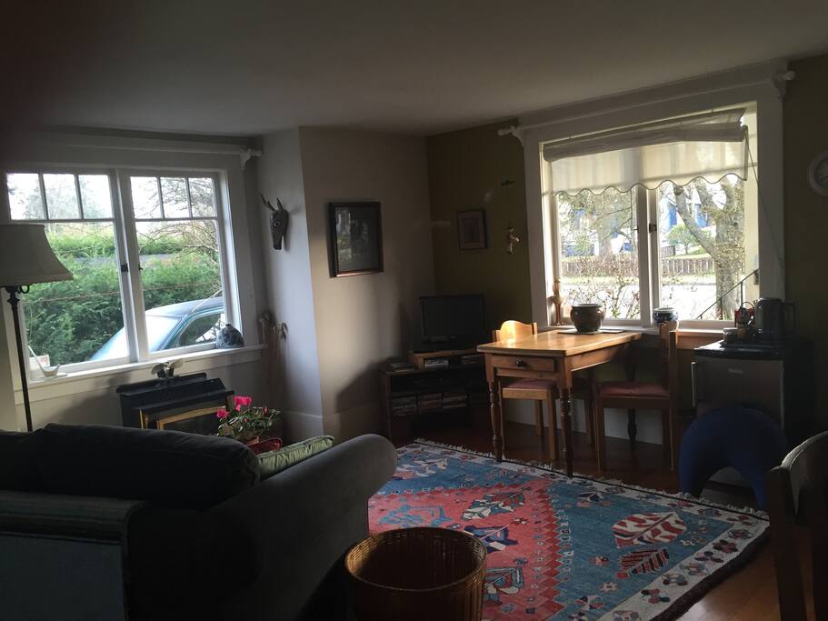 Living room with fridge , kettle, tea and coffee available