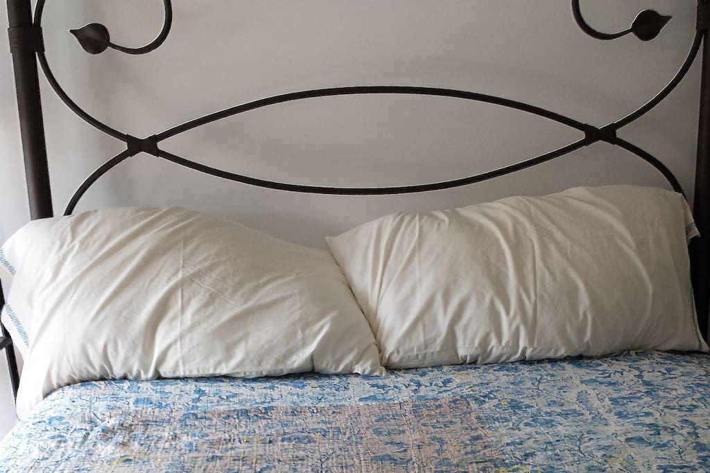 You'll sleep in a handcrafted wrought iron queen size bed