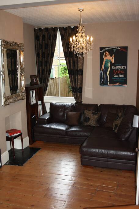 Large lounge with 2 substantial areas to relax, including a large and comfortable sofa