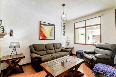 Casa de Flores y Faroles, surrounded by nature.