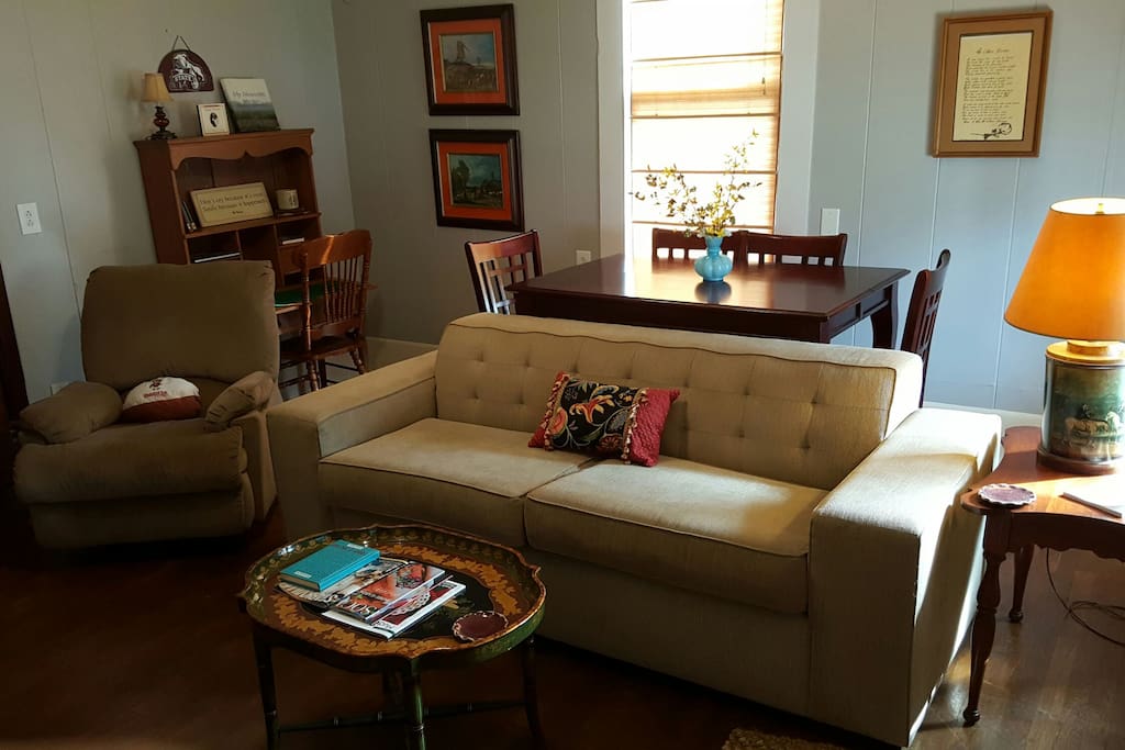 Bar Table behind sofa seats 4