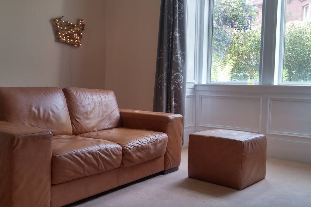 The living room - big windows look out over a small garden