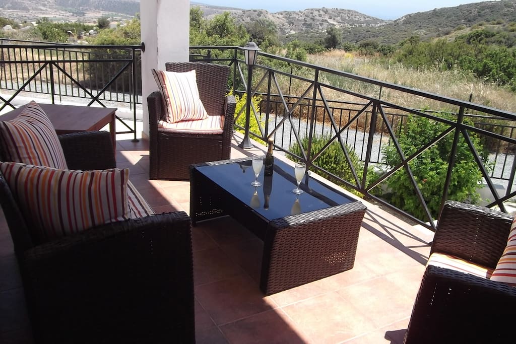 An Evening drink in the seating area on the Veranda