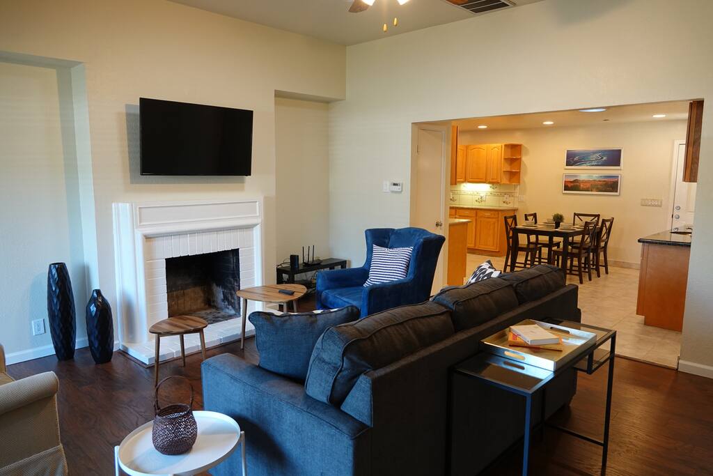 Spacious living room with 50" HDTV and cable