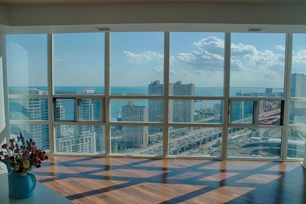 Shared Living Room with floor to ceiling window, unblocked view