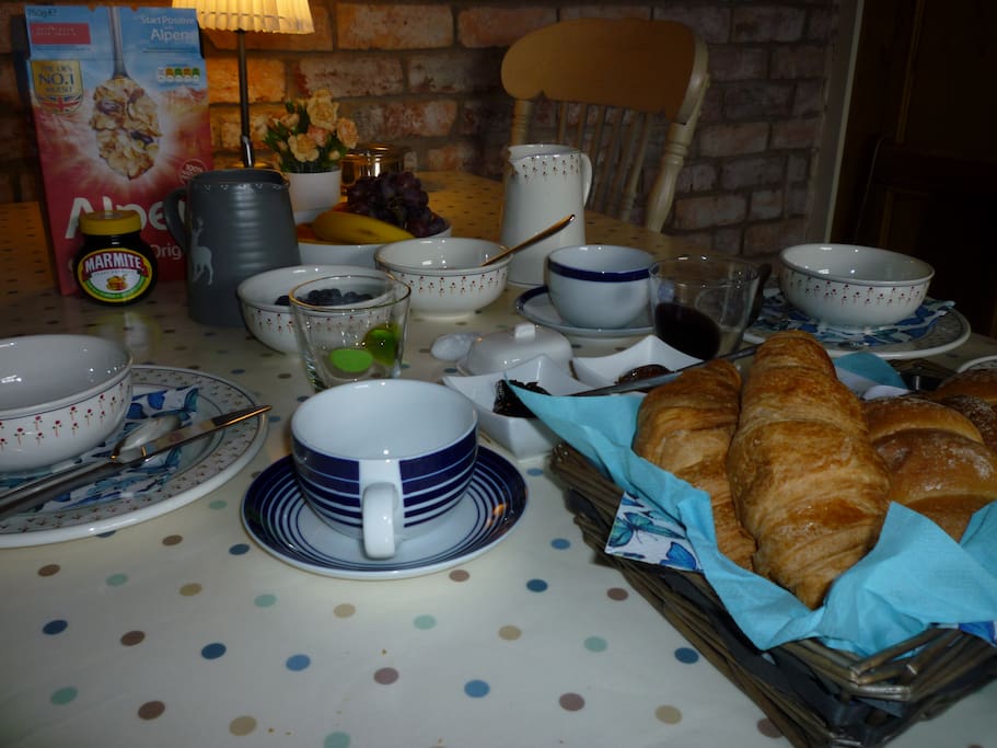 preserves, cheese, yogurt, croissant, rolls and fresh coffee. yum.