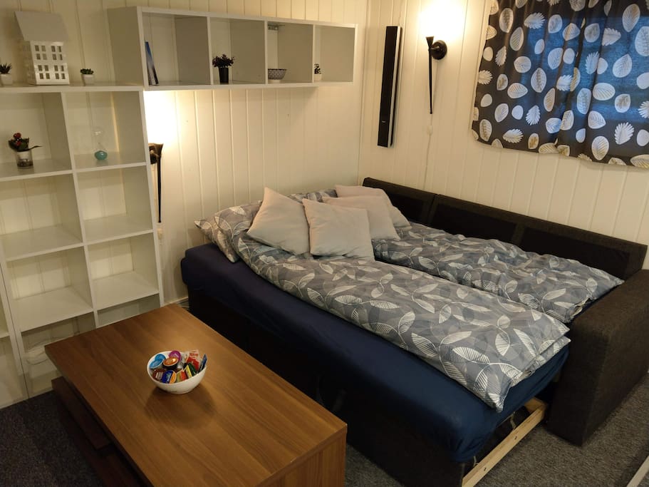 Sofa bed with extra mattress, ready for the night
