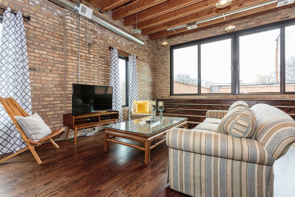An open layout and windows make the upstairs living space so airy!