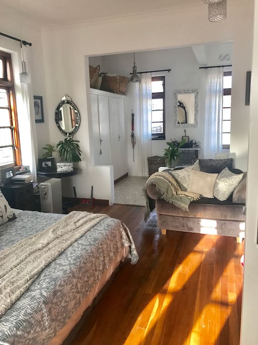 Large spacious main bedroom leading into bathroom
