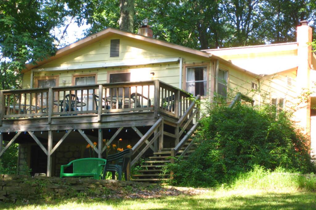 Enjoy the back porch overlooking forest and pond