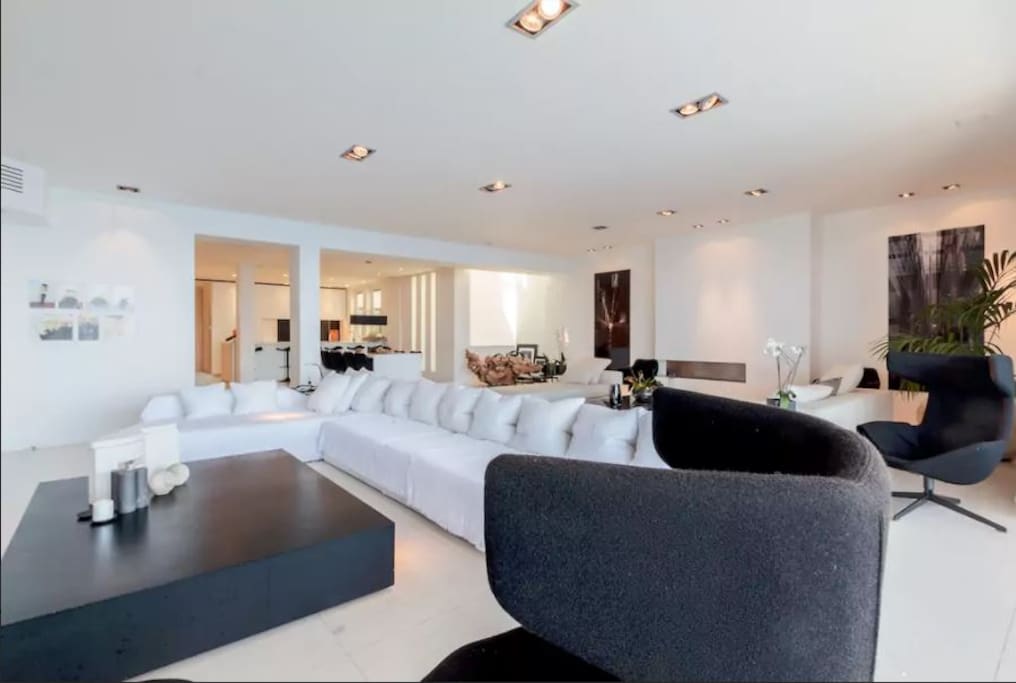 Photo taken by Airbnb Photographer - Cascade view onto living and dining room.