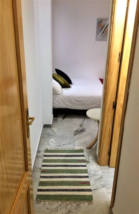 Bedroom entrance hallway and private bathroom entrance