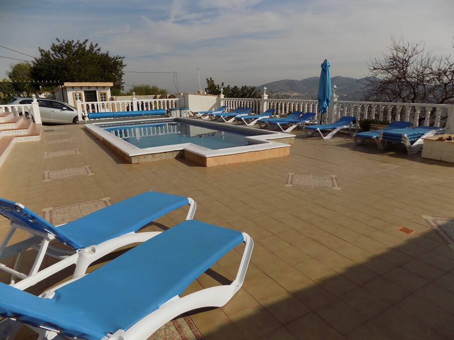 Private pool with sunbathing