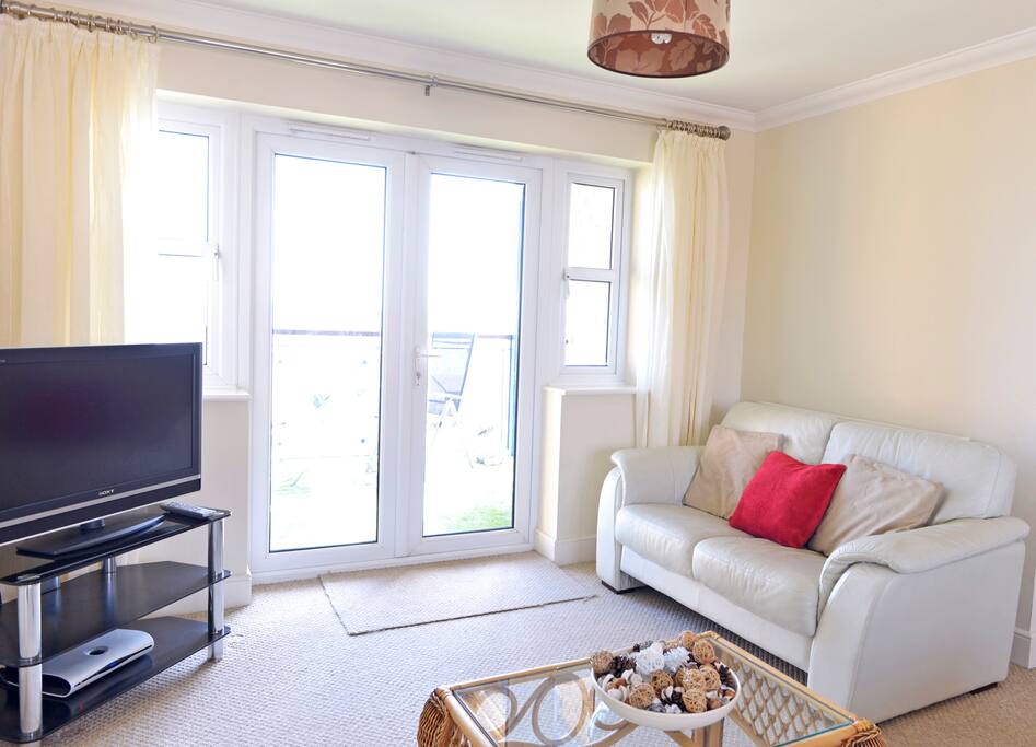 Living area has French doors to balcony