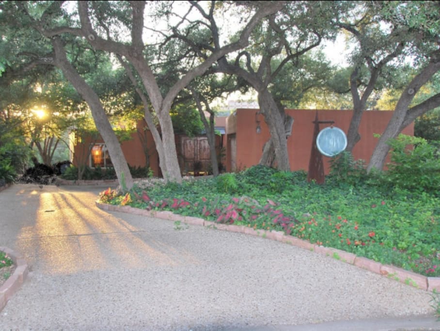 Escape to our cliff-side Barton Creek hideaway shaded by a canopy of live oaks.
