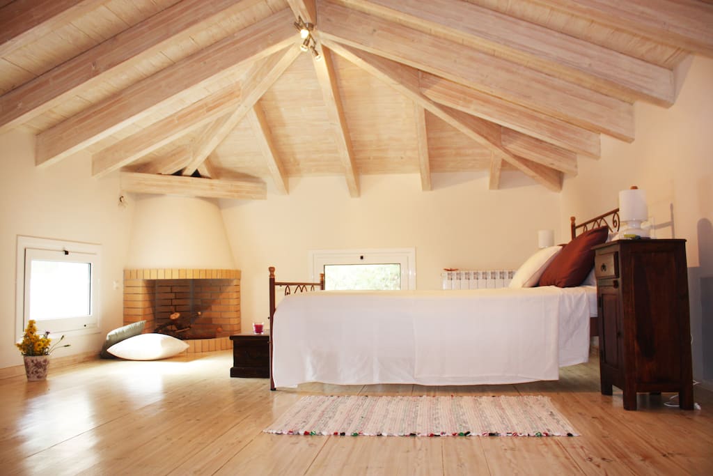 Cozy attic master bedroom (enough room for an extra or baby bed) with private bathroom