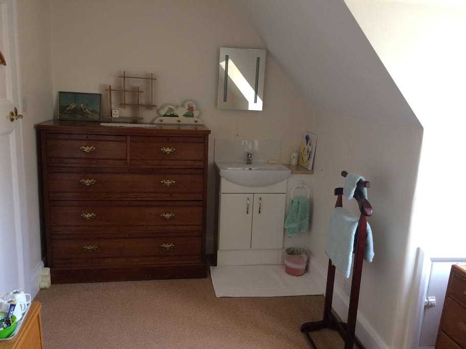 New basin with mirror above. Shaving/toothbrush point with integral lights. Bath robes on request for more than one night stay.