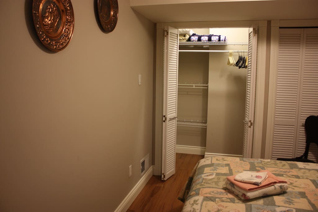 Closet with shelving and lights