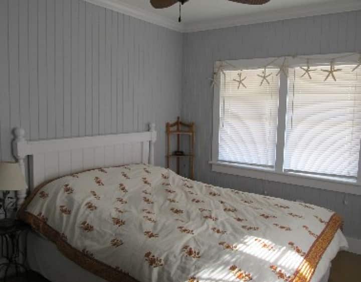 Master bedroom with queen bed.