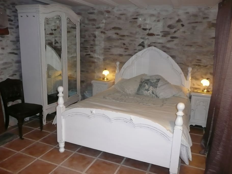 Bedroom with kingsize bed and en-suite shower room