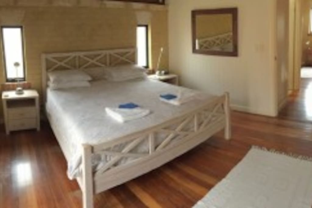 King bedroom with balcony on the left.