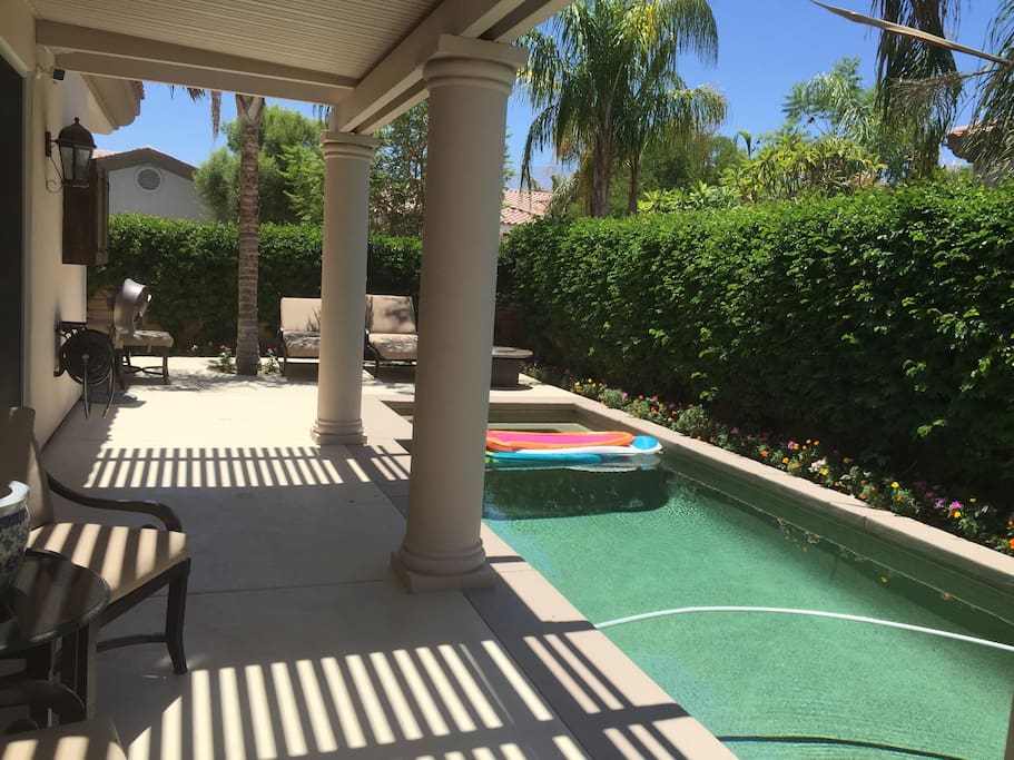 Pool area has out door speakers,TV, pool flotations for lounging in the totally private back yard