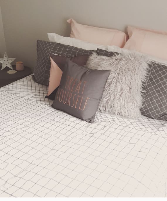 Your bedroom. Queen sized bed, small wardrobe able to be used.