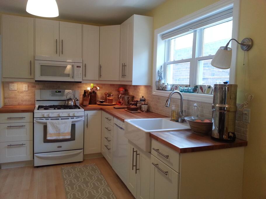 bright, sunny kitchen; all equipment for your cooking needs, with dishwasher